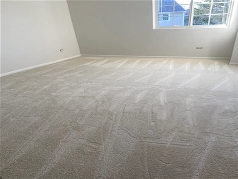 New bedroom carpet installation showing fresh stretch lines