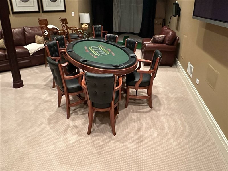 Basement carpet tiles installed in a finished basement game room