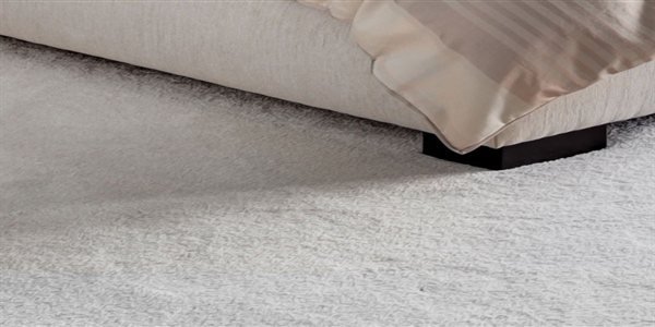 Shaggy carpet with long soft pile installed in a living room